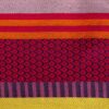 Nappe rayée et colorée pour une table printanière en tissage jacquard français.
